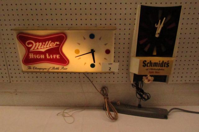 (2) Lighted Beer Signs and Including: Miller High Life: (2) Lighted Beer Signs and Clocks Including: Miller High Life, The Champagne of Bottled Beer and Schmidt's of Philadelphia Light Beer, Both Work at Time of Cataloging