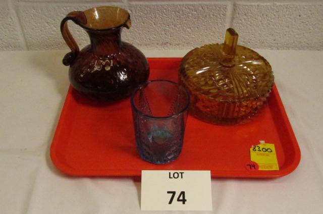 Amber and Blue Glass Items: Amber Glass Pitcher, Amber Glass Covered Bowl, and Blue Drinking Glass