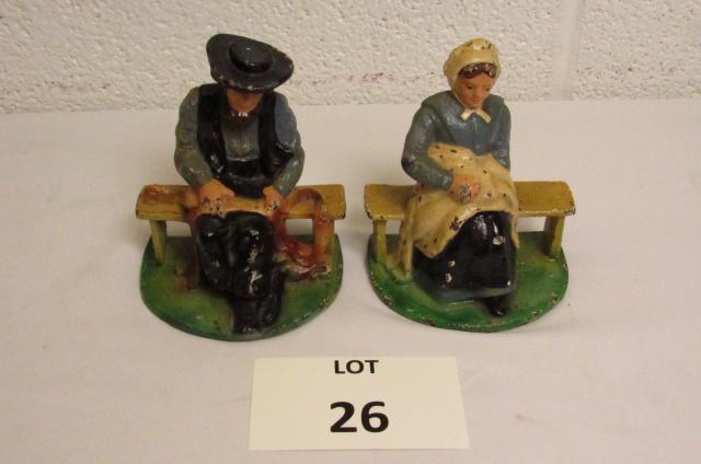 Cast Iron Amish Bookends of Man and Woman: Cast Iron Amish Bookends of Man and Woman Sitting on Benches, Measures 5-1/2" h x 4" l x 3" w