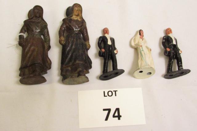 (5) Metal Figures Including: (2) Grooms: (5) Metal Figures Including: (2) Grooms, (1) Bride and Cast Iron Amish Couple