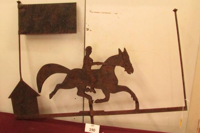 Horse and rider weathervane: Folk Art Horse and Rider weathervane with a house or school with a large flag and a tall pole in the front. The horse and rider are wood with sheet iron cladding secured with rivets. The building, pol