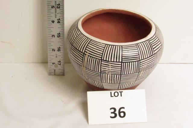 Amelia Galvan Pot: Amelia Galvan, Jemez Pueblo, New Mexico clay pottery pot. Signed on base. 4 3/4" T, 5 3/4" across.