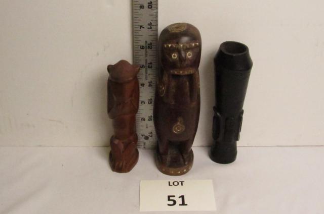 Carvings: Wood carving of man from the Trobriand Islands 7 1/2" L, Tribal carving of a monkey 5 1/2" L, ebony hand carved vase 6 1/2".