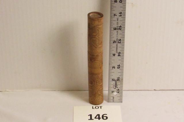 Betel Nut Container: Indonesian Betel nut container. A decorated wood cylinder container 7 1/4" L