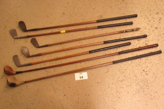 Wood shaft golf clubs: Lot of 7. Wood shaft, 2 putters and 5 drivers. Assorted makers.