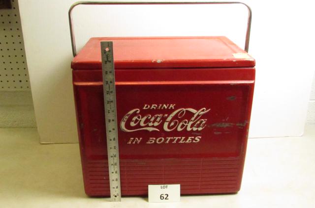 Coca Cola cooler: Red drink Coca Cola cooler with long handle above and sided handles. Internal tray.