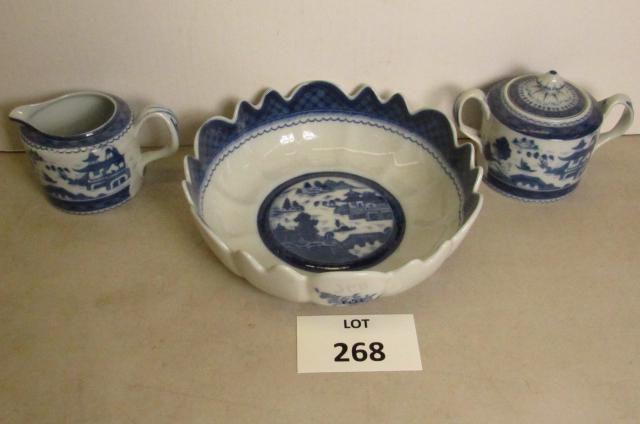 Mottahedeh porcelain: Lot of 3 pieces. Mottahedeh bowl and creamer and sugar. Bowl is 9 12" acoss and 2 7/8" tall. Blue Canton pattern.