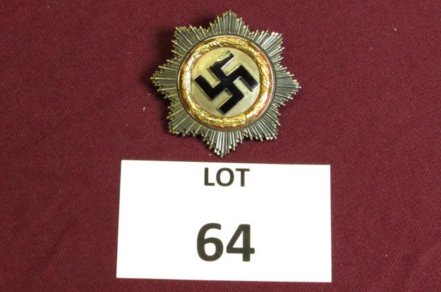 WWII German Cross in Gold: WWII German Cross in Gold **Disclaimer**: Given COVID-19 restrictions and the influx of replicas on the market, we are unable to authenticate some of the German Nazi items listed for auction. Purchase