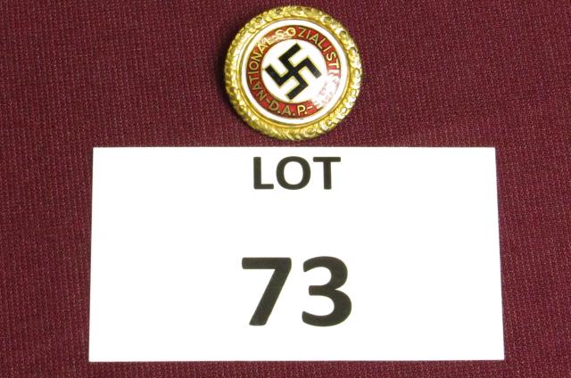WWII German Nazi Golden Party badge. Back of badge is: WWII German Nazi Golden Party badge. Back of badge is marked "Party Member Number 3682" **Disclaimer**: Given COVID-19 restrictions and the influx of replicas on the market, we are unable to authentic