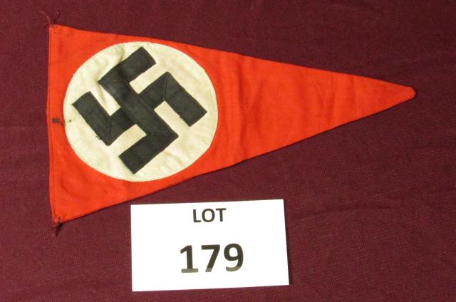 WWII German Swastika flag fender banner. Measures: WWII German Swastika flag fender banner. Measures approximately 9" x 5" with noticeable staining **Disclaimer**: Given COVID-19 restrictions and the influx of replicas on the market, we are unable to 