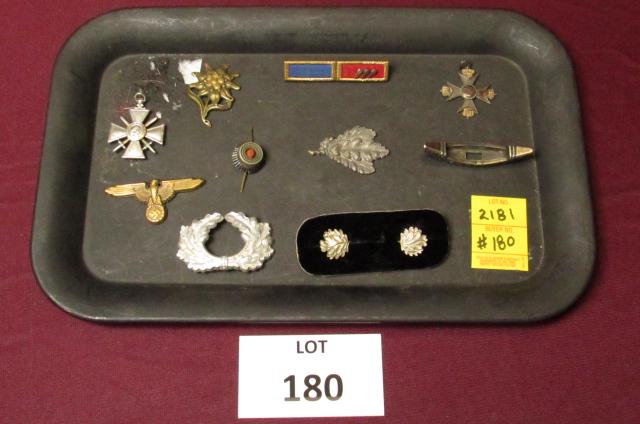 Tray lot of ten pieces of WWII German military-related: Tray lot of ten pieces of WWII German military-related items including Officer's Edelweiss hat insignia and Dagger Guard **Disclaimer**: Given COVID-19 restrictions and the influx of replicas on the m