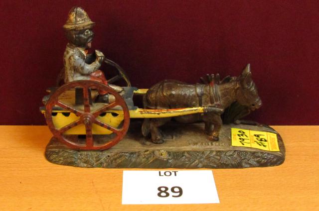 Cast iron mechanical bank: "Bad Accident" cast iron mechanical bank. Functioning well. 9 3/4" long x 6 1/4" tall