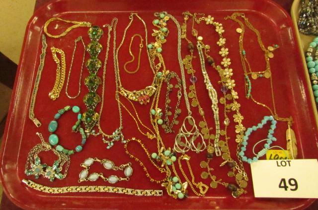 Costume jewelry lot: Gold and silver tone necklaces, beads, bracelets with stones