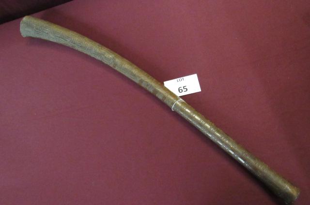 Incised Fiji wood club: A very fine incised Fiji wood club of "gunstock" form - 35" long with the entire surface carved in rectangular panels that taper to the butt end. Has good age and A-1 condition.