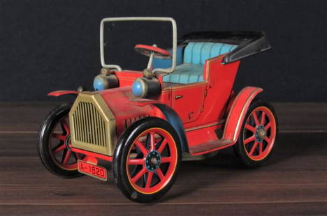 Antique 1950's friction operated tin litho car.: Antique red convertible car. Friction operated. Made by Modern Toys in Japan. Patent No. 27579.