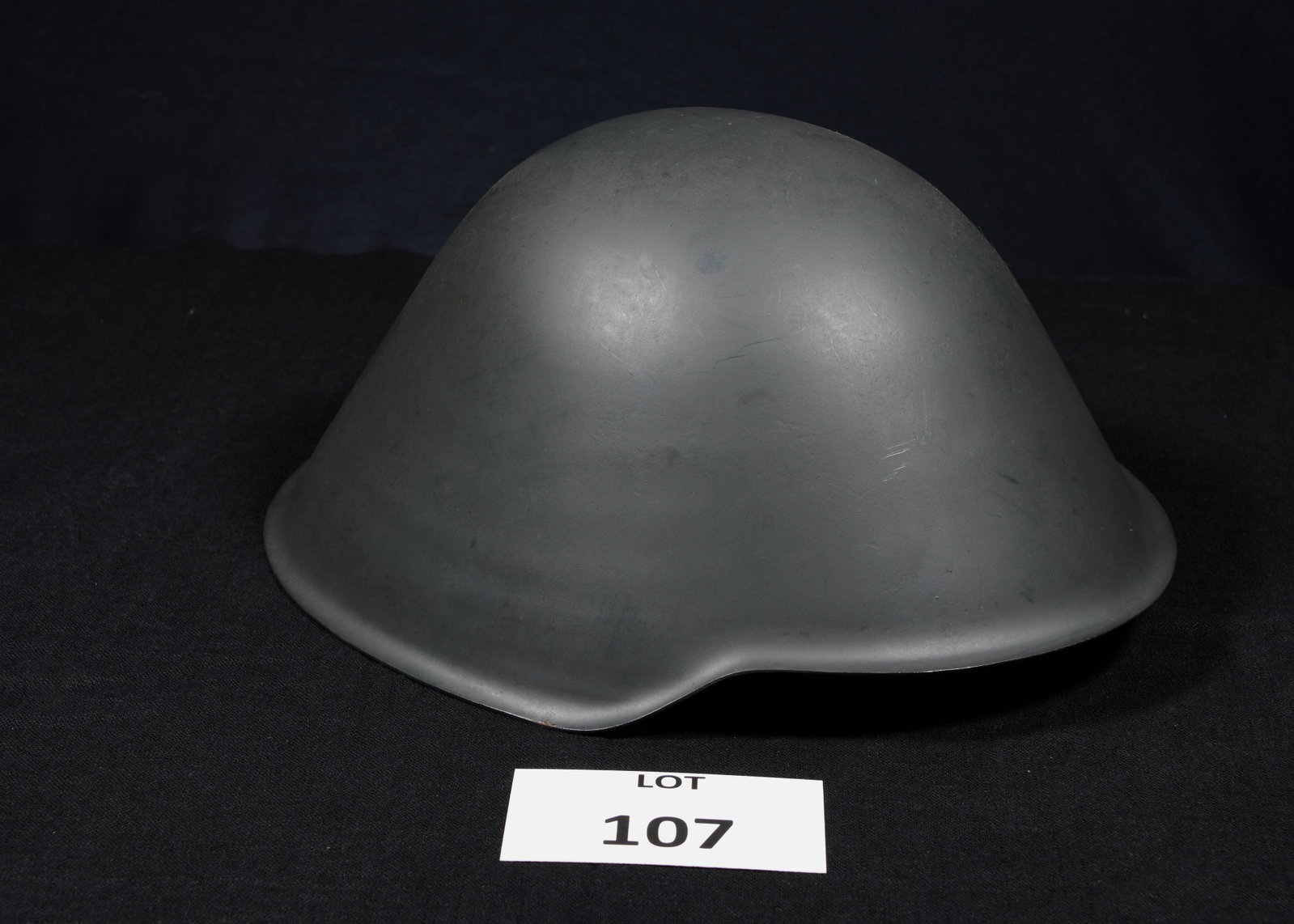 WWII East German Military Helmet: A WWII East German military helmet with original liner used. *notes- minor scratching to the exterior of the helmet. Interior in great shape.