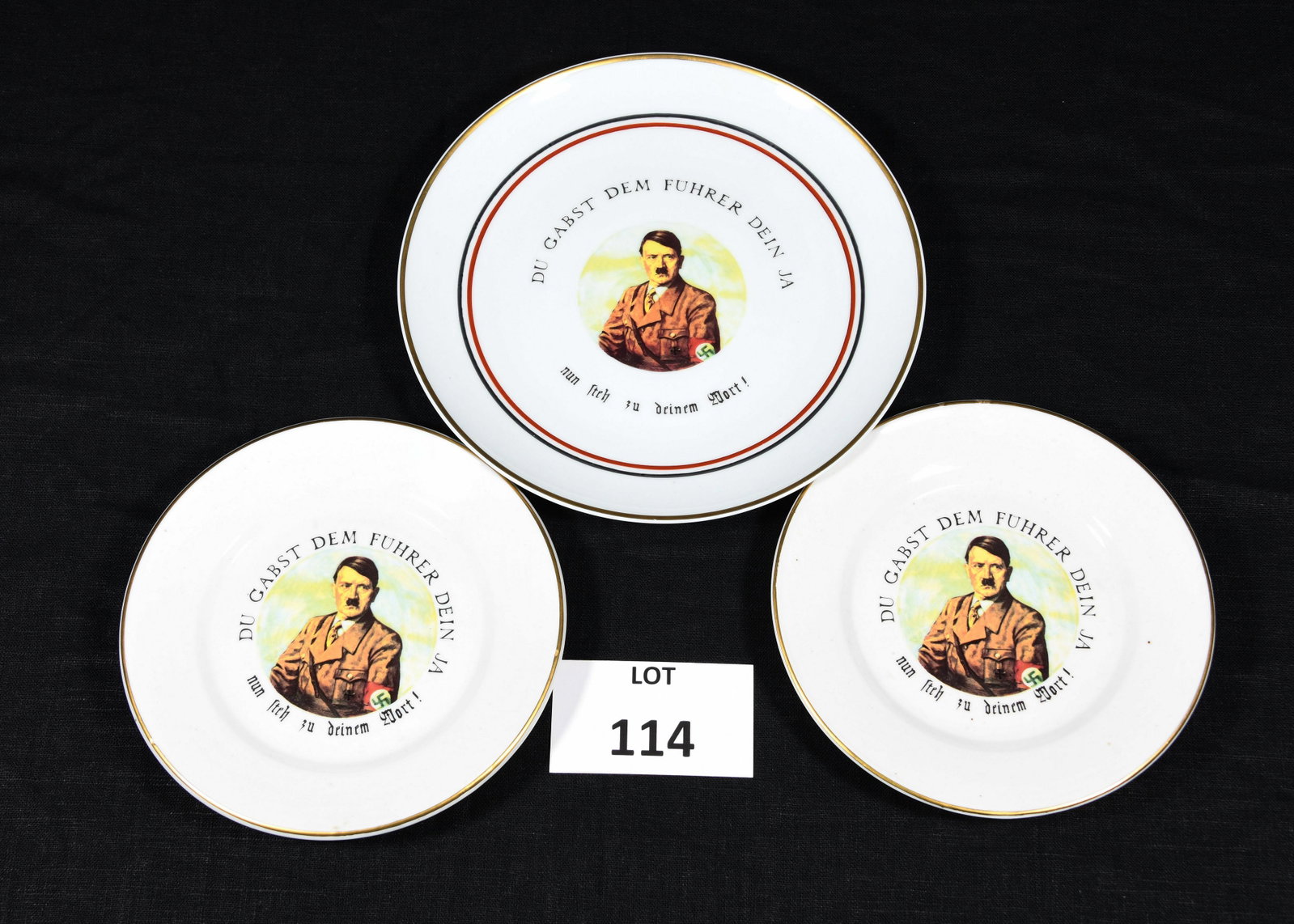 Collection of 3 Adolf Hitler Plates: Vintage Adolf Hitler Fuhrer campaign plates. Includes 2 small plates and 1 dinner plate with inscription of "Du Gabst Dem Führer Dein Ja, nun steh zu deinem Wort." This translates to "Your Yes- for t