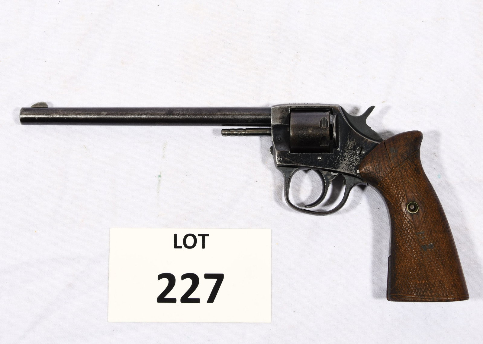 H&R "Scout Model" .22 Cal Revolver: An H&R "Scout Model" .22 cal revolver. 7-shot .22 short only. This revolver has a 6" barrel. These were made as private run for Belknap Hardware of Louisville, KY. Only 100 were made. This revolver is