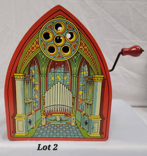 Antique J. Chein & Co. Tin Litho Church Organ Music Box: An antique tin lithograph church organ crank music box made by J. Chein & Co. This toy has a hand crank on the side that produces an organ sound with turned. The colorful lithographs mirror the