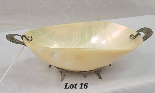 Antique Mother Of Pearl Caviar Dish: A stunning antique Mother of Pearl caviar dish with ornate silver filigree base. 7"x3"x2 1/2". *notes- mild tarnish on silver.