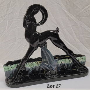 Royal Haeger Mid Century Modern Ceramic TV Lamp Base: A vintage glazed ceramic figural ram/gazelle TV lamp base. This piece is black with green and gray accents. Has a beautiful glossy finish. No light fixture included. Underside is covered with