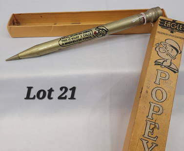 Antique 1929 Popeye Eagle Pencil: An antique 1929 Popeye pencil made by the Eagle Pencil Company. This pencil has a gold toned finish and has a Popeye graphic with word bubble that reads "Well, blow me down this is what I call a