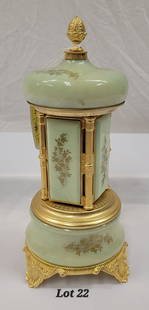 Antique Jade Cigarette Dispenser: An antique jade toned cigarette dispenser with gold toned accents. Floral motif painted on top, base and doors. Made by San Francisco Music Box Company. Marked Made in Italy. Music box crank is