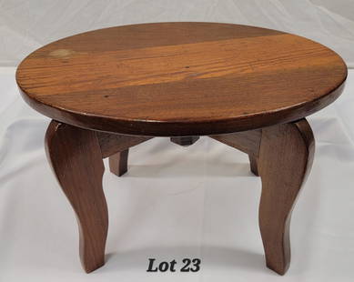 Antique Stool Made From White House Plank: An antique stool made from a plank from the White House after renovations to the roof in 1926. Made by Lank Woodwork Company. Underside of stool has write up regarding the history of the wood used to