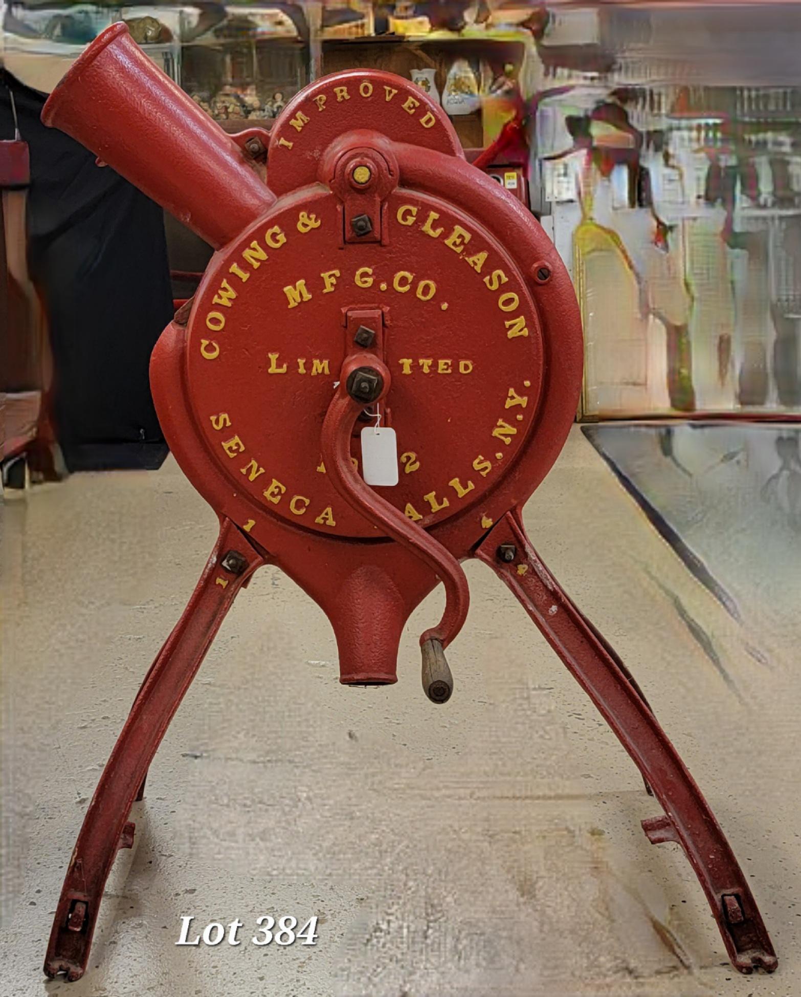 Antique Cowing & Gleason Mfg. Co. Cast Iron Corn: An antique Cowing & Gleason Mfg. Co. cast iron hand crank corn sheller machine. Made in Seneca Falls, NY. Painted red with yellow lettering. 38"x 23"x 17". *notes- pick up only