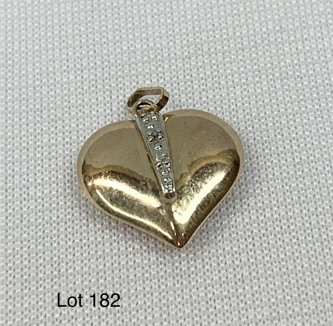 10K Gold Heart Pendant: A 10K gold heart pendant. 0.40 dwt.
