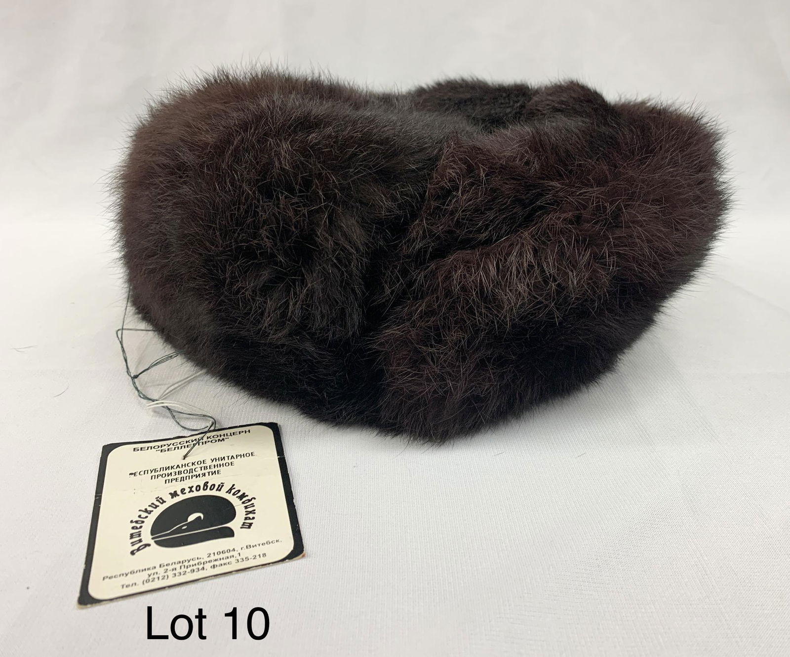 Russian Mink Fur Trooper Hat: A Russian made mink fur trooper hat with original tags. 10" x 11" x 4".