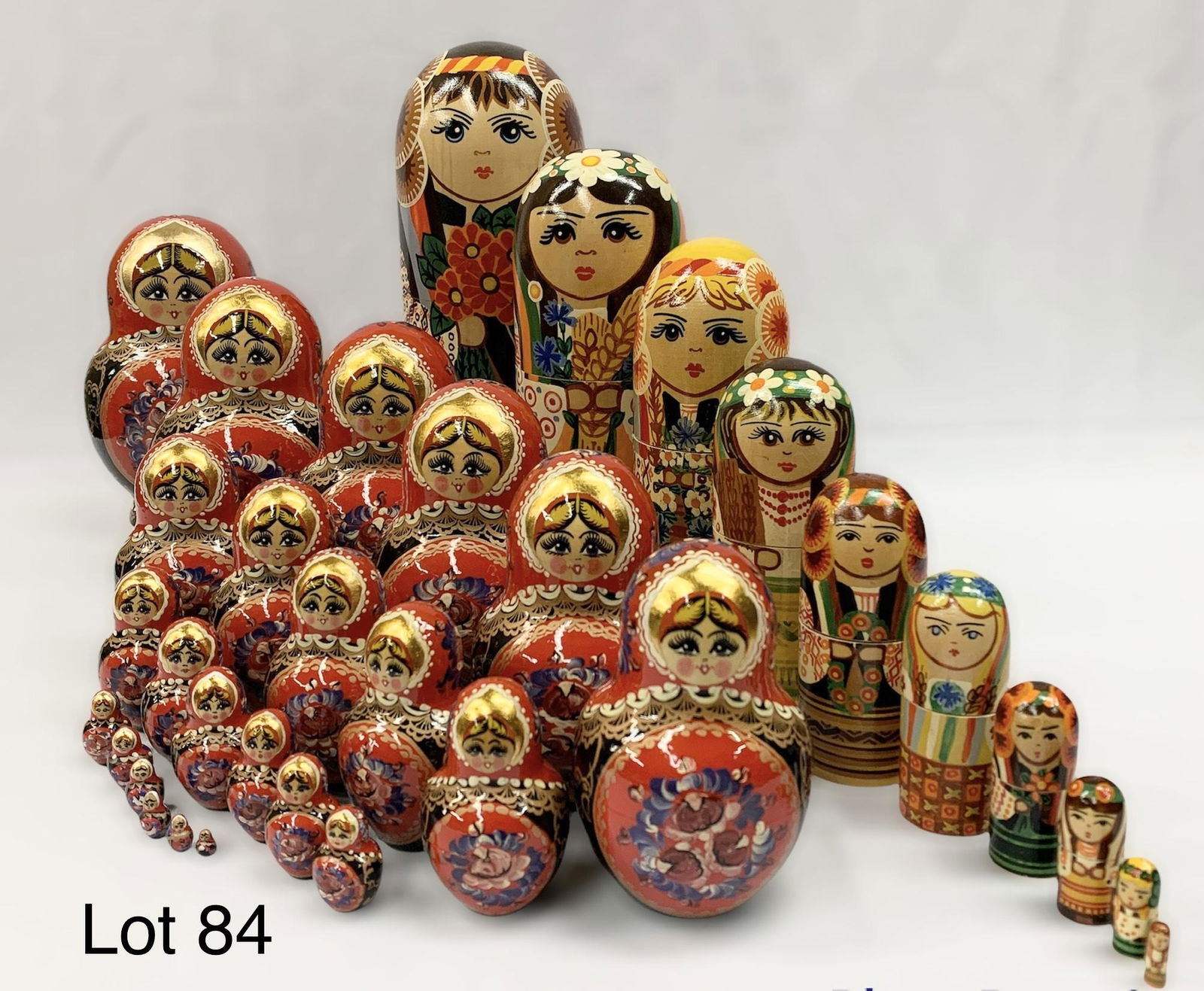 Pair of Vintage Handpainted Russian Nesting Dolls: A pair of vintage hand painted Russian nesting dolls. Large set is 11" tall and marked "#8275 Tamara" and has a sticker that says "made in Ukraine." The smaller set is marked "Cepruel Socad 1996, 25M"