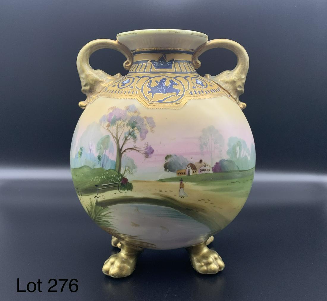 Hand Painted Nippon Footed Vase: Hand painted Nippon footed vase with landscape scene. 8 1/4" tall. Nippon makers mark on bottom.