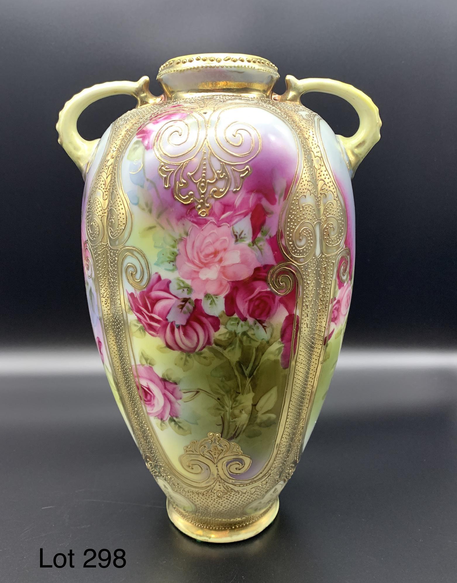 Hand Painted Nippon Rose Vase: A beautiful hand painted Nippon vase with hand painted rose designs and gold toned accents. This vase is 10" tall.