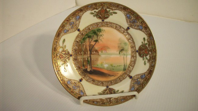 HANDPAINTED NIPPON PLATE: 6 1/8", handpainted, raised gold gilt, marked green crest, excellent condition with no chips, cracks or repairs