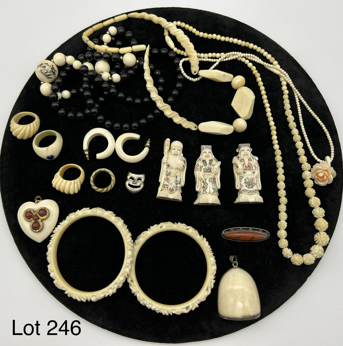 Collection of Carved Bone Jewelry: An impressive collection of carved bone jewelry. Includes beaded necklaces, carved bangle bracelets, carved rings, pendants, brooches and three carved figures.