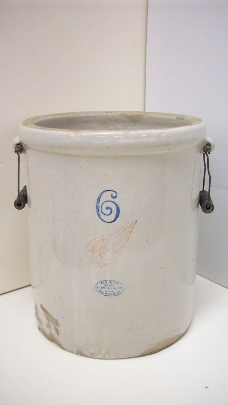 Redwing 6 Gallon Crock: 6 gallon crock with attached wire and wood handles, has 6, Red Wing Logo and Red Wing Union stoneware Co. Red Wing Minn on the front, also Patented Dec 21 1915 under the handle, has some glaze loss, G