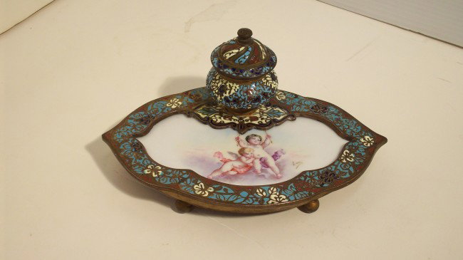 Sevres Style Enameled Inkwell: 6 3/4" across X 4 1/4" X 3" tall, French 19th century. Ceramic panel with Cherubs singed by Lucy (?), Champleve Enameled metal base and lidded well, Excellent condition