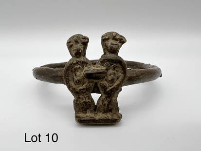 Bobo Tribe Brass Bracelet: An older brass bracelet with two human figures. Bobo Tribe from Burkina Faso.