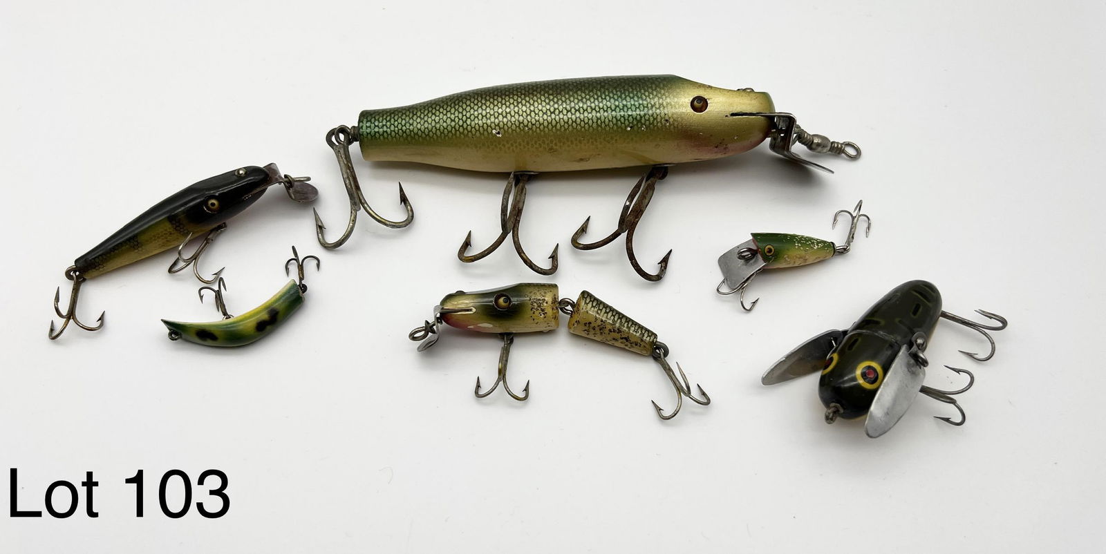 Lot of Vintage Wooden Lures: A lot of 6 vintage wooden lures including 1 Pre-1957 Heddon Crazy Crawler, 2 Creek Club Pikies, 1 Jointed Pikie, 1 Lazy Ike and 1 unknown.