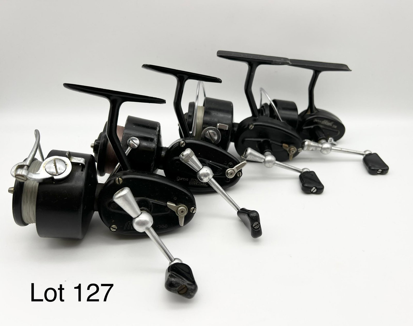 Tray Lot of Mitchell Reels: Tray lot of four vintage Mitchell reels, one 308 and three 300s. All are in very good to excellent condition.