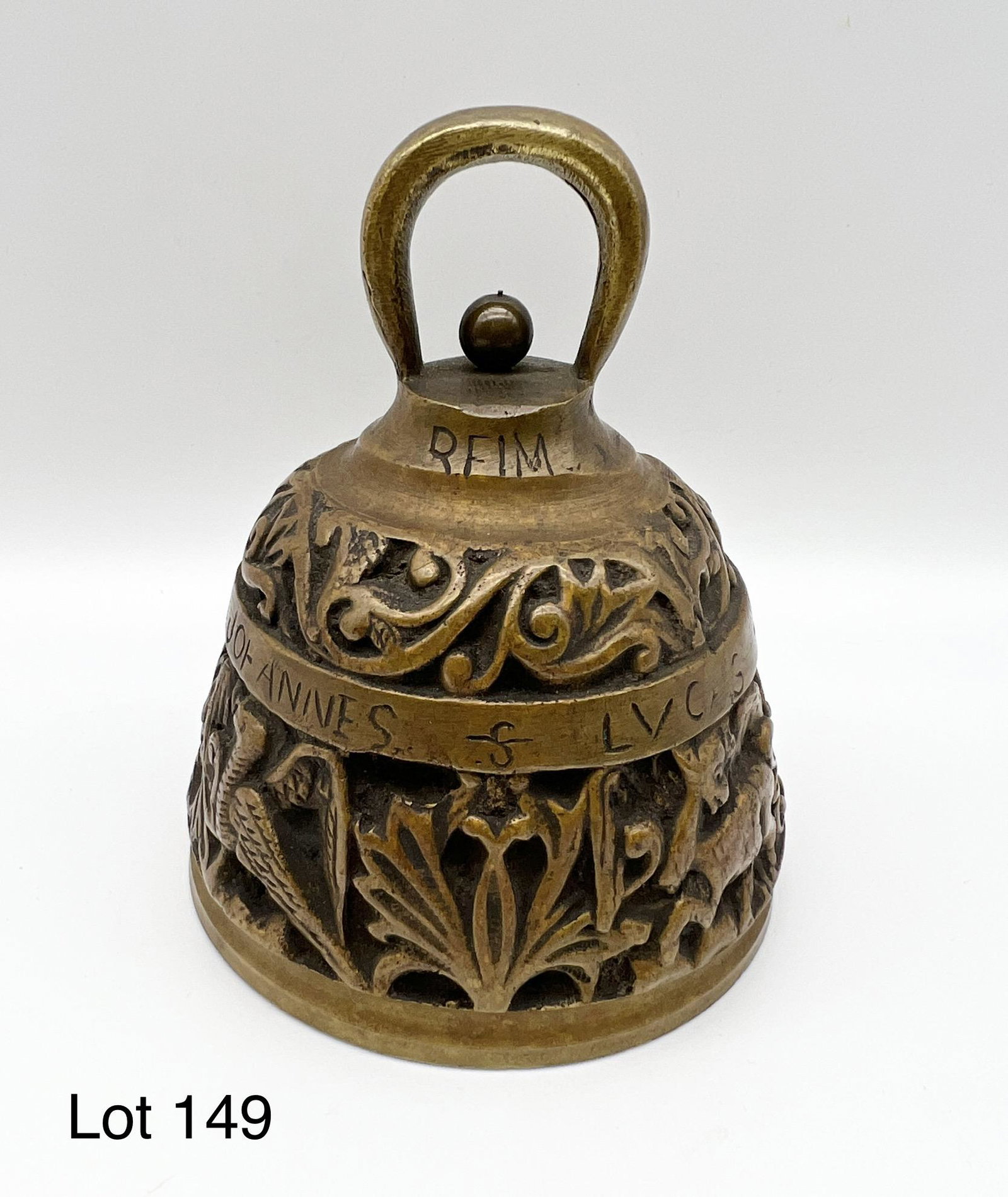 Vintage Brass Sanctuary Bell: Vintage brass sanctuary bell with apostle names "Johannes, Lucas, Marcus and Mathew" wrapped around the center body. Elaborate animal and human figures are wrapped around the bottom. The top of bell r