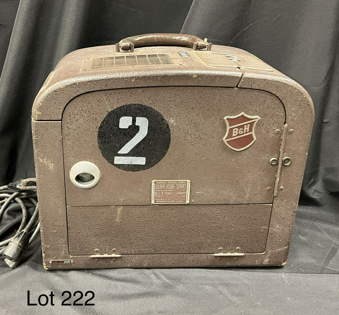 Vintage Bell & Howell Filmosound Projector: A vintage Bell & Howell Filmosound 16mm sound-on-film projector. Design number 185. 117 volts, 10 amps. Made in USA. Projector is untested. Measurements are 16" x 14" x 10 1/2".
