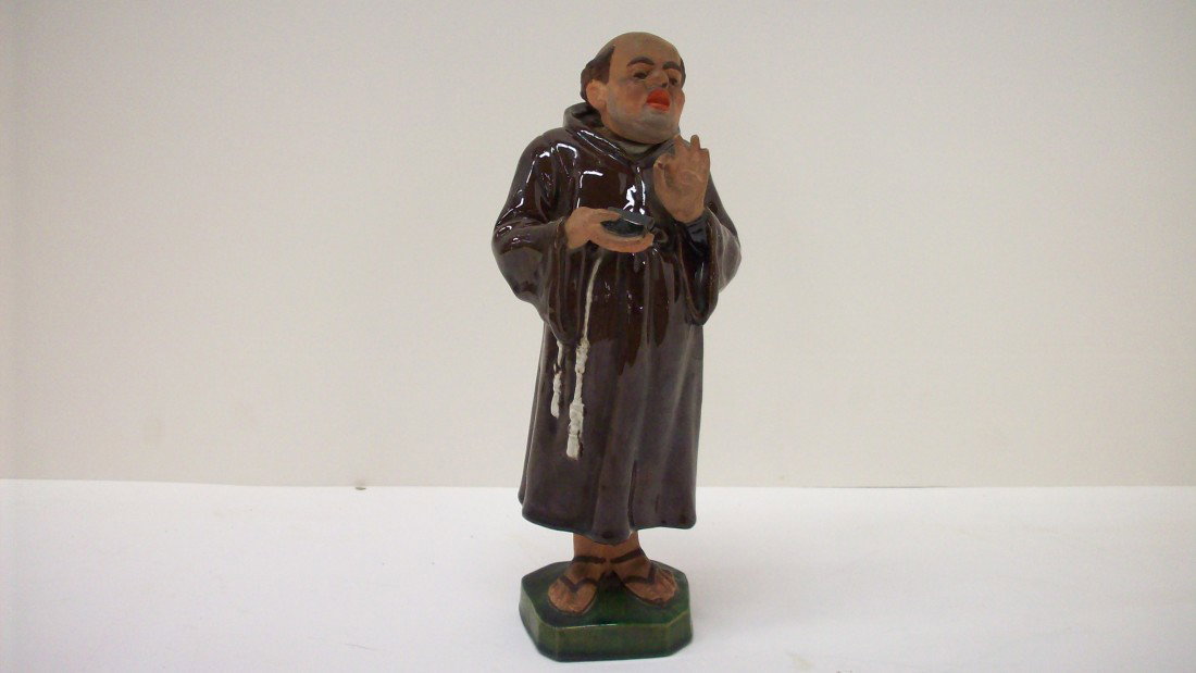 Portuguese Motion Figure Friar/Monk: 10 1/2", A mark bearing the inscription "José A. Cunha(1885) Successor, Caldas, Portugal" suggests the factory was continued by others. has a hinged body and head, allowing each to swing front to bac