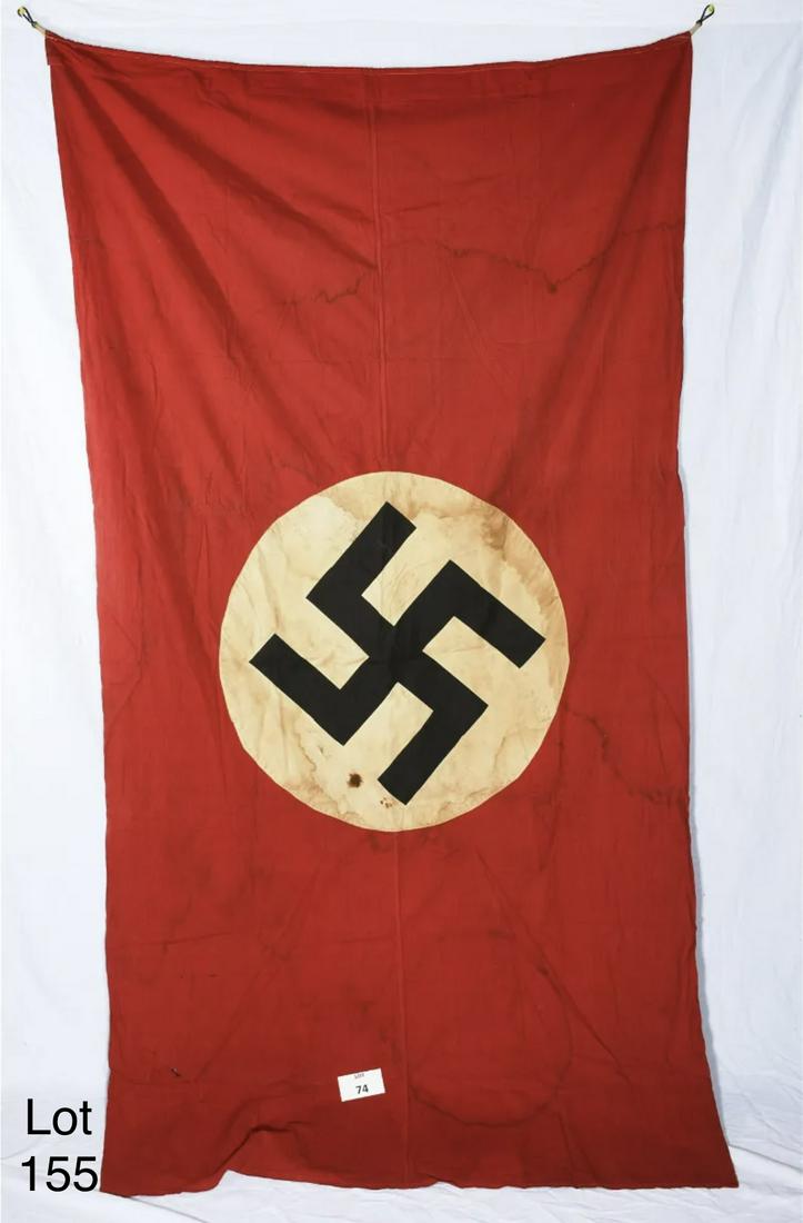 Large WWII German Nazi Battle Flag: Large WWII German Nazi battle flag. This flag measures 4 ft x 7 1/2 ft. Has clips on each end for hanging. *notes- significant wear, staining, holes.