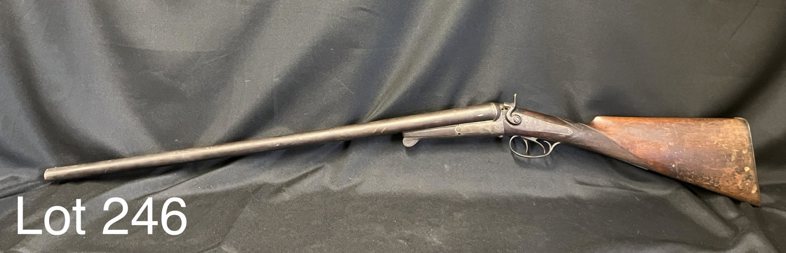Antique W. Richards 12 Gauge Underlever Double: An antique W. Richards 12 gauge underlever double barrel shotgun. Made in Belgium. Has 30" barrels, whole thing measures 46 1/4". Missing right hammer. *notes - patina and wear with age