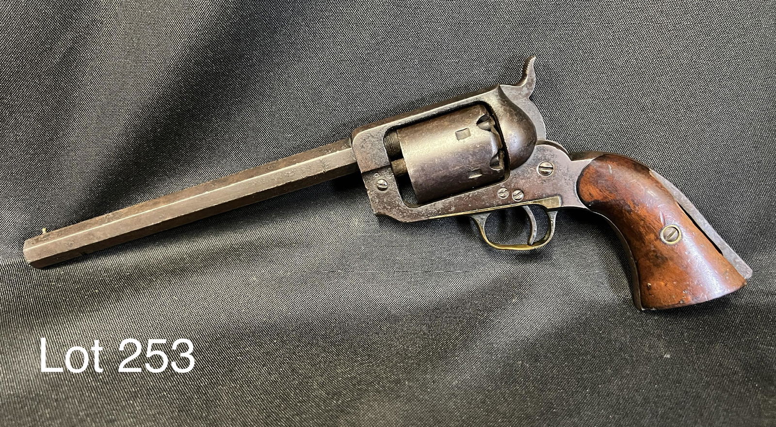 E. Whitney Percussion Cap Revolver: Antique E. Whitney Percussion cap revolver with octagonal barrel, measuring 7 3/4" long. Maker's mark noted on top of barrel, serial no. 1687 on bottom. *notes - wood cracked on grip, missing pieces,