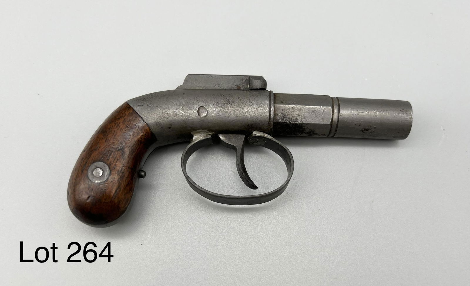 Antique Percussion Cap Boot Gun: Antique percussion cap boot gun with wood handle and half round/half octagonal barrel. Patent on action mechanism dated to April 16, 1845. Serial number on underside of barrel #1012. Measures 5" long