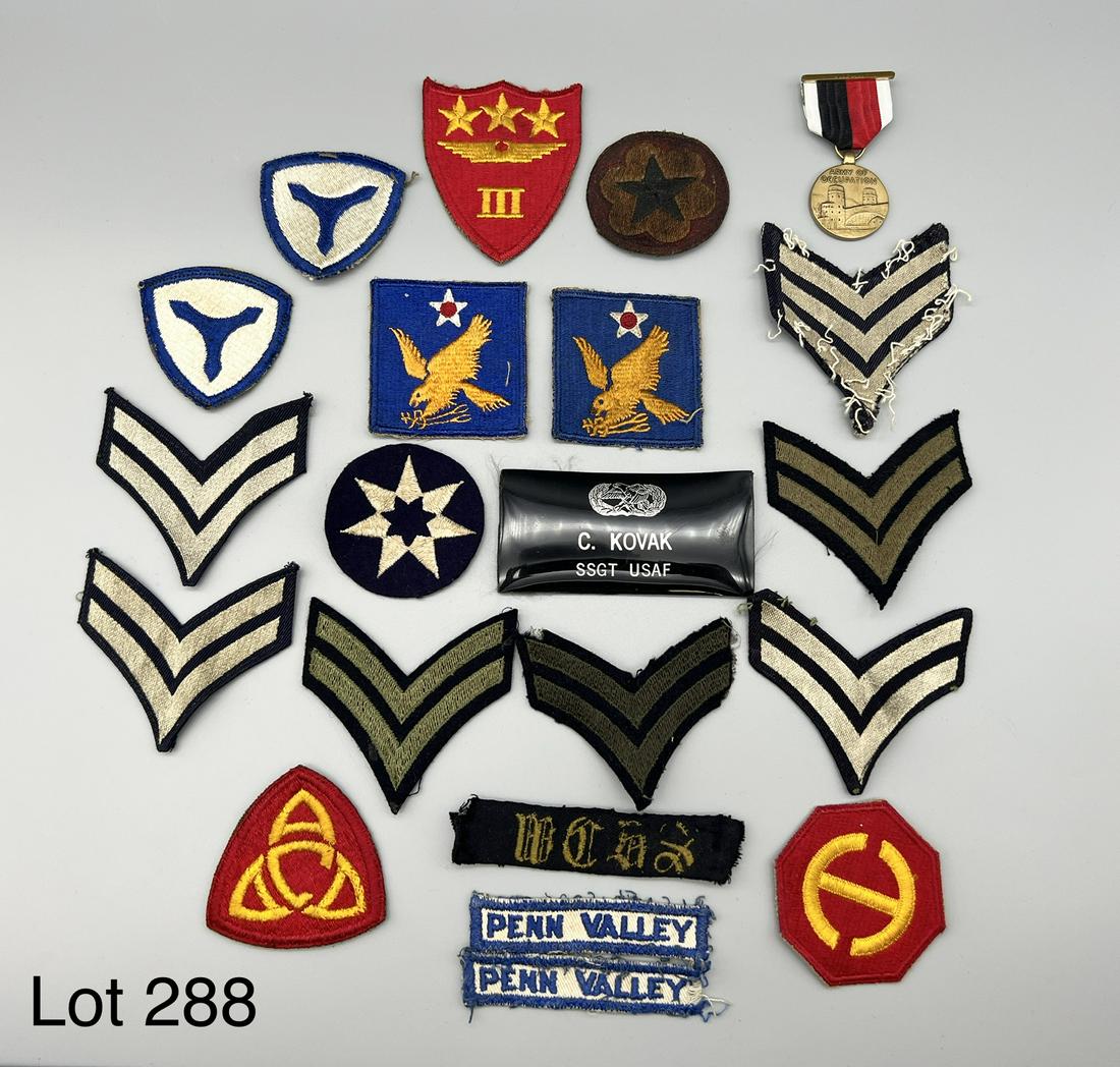 Collection of Military Patches and Medals: A variety of vintage military patches including 2nd Air force, US Marine Corp Aircraft Fuselage 3rd Wing, several rank patches and more. Also included is an Army Occupation medal and ribbon pin from 1