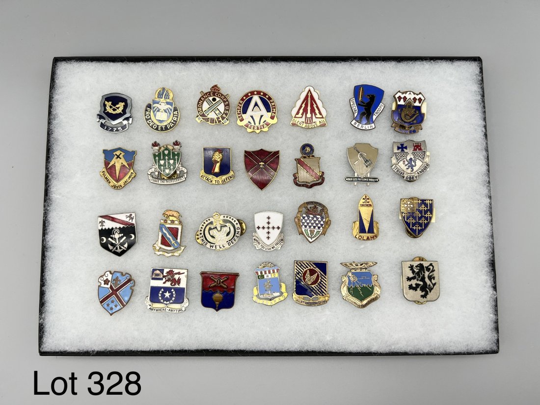 Collection of Military Insignia Pins: Lot of 28 insignia pins. Includes WWII Air Force 35th Fighter Group, Army Special Troops Berlin Brigade, Phillippine Scout Heritage Society, 68th Air Defense Artillery Unit Crest, Army Chaplain Corps 